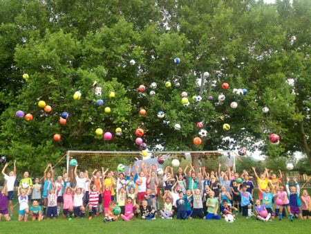 RRSC Youth Teams Tossing Balls Up